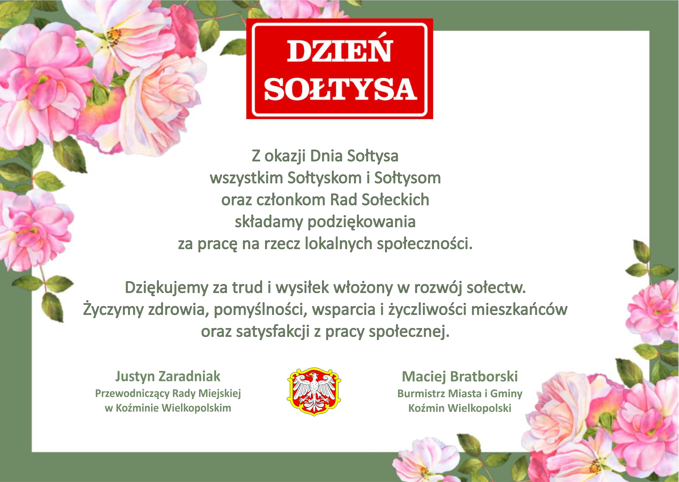 biały napis dzień sołtysa na czerwonym tle, poniżej życzenia przedwodniczącego rady miejskiej oraz burmistrzaymi kwiatami